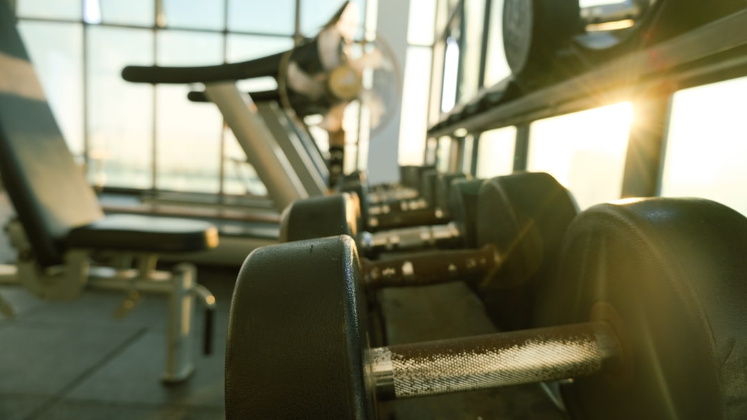 why-choose-us a-row-of-exercise-equipment-in-a-gym-z6cqkip-j18